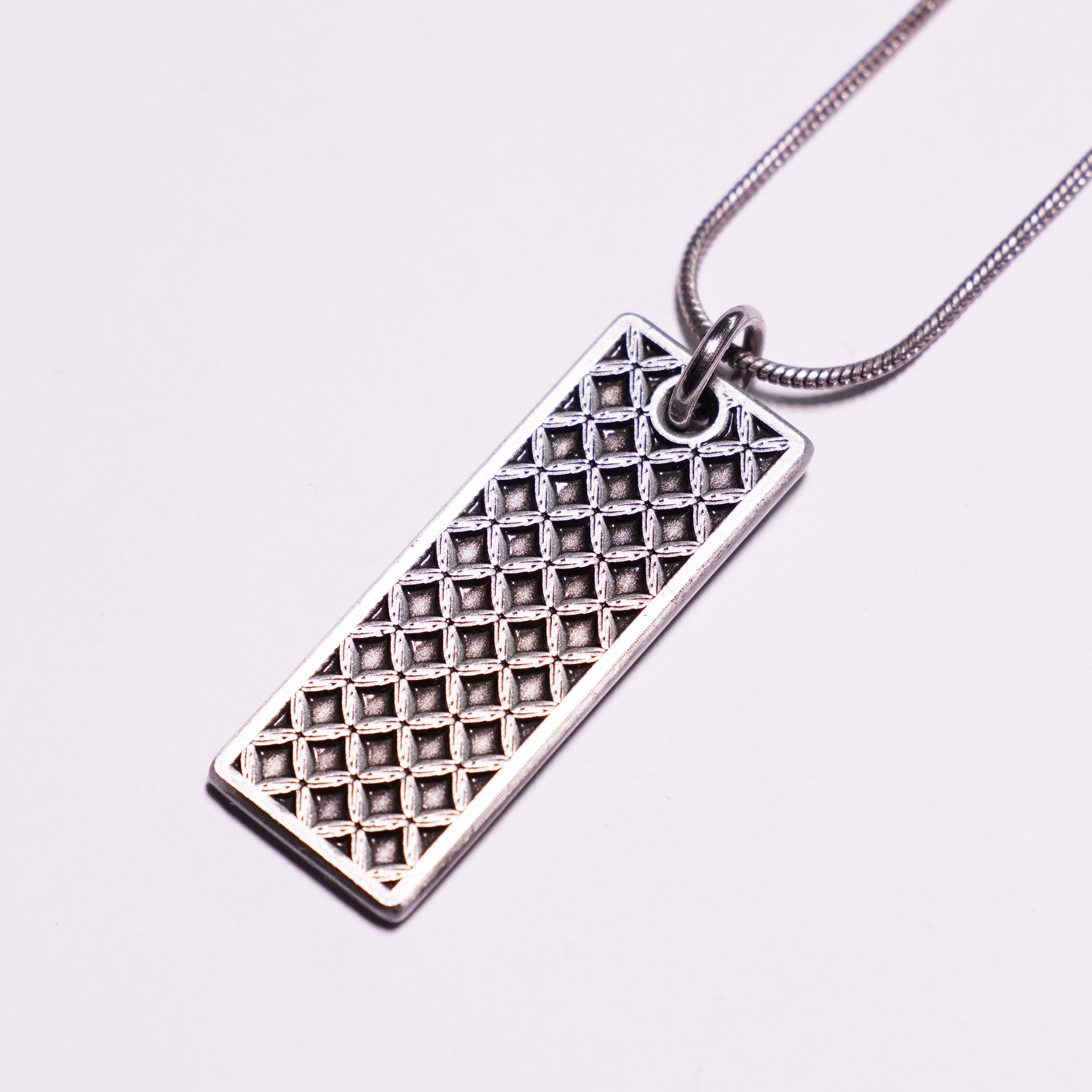 "STEEL CAGE" TAG NECKLACE