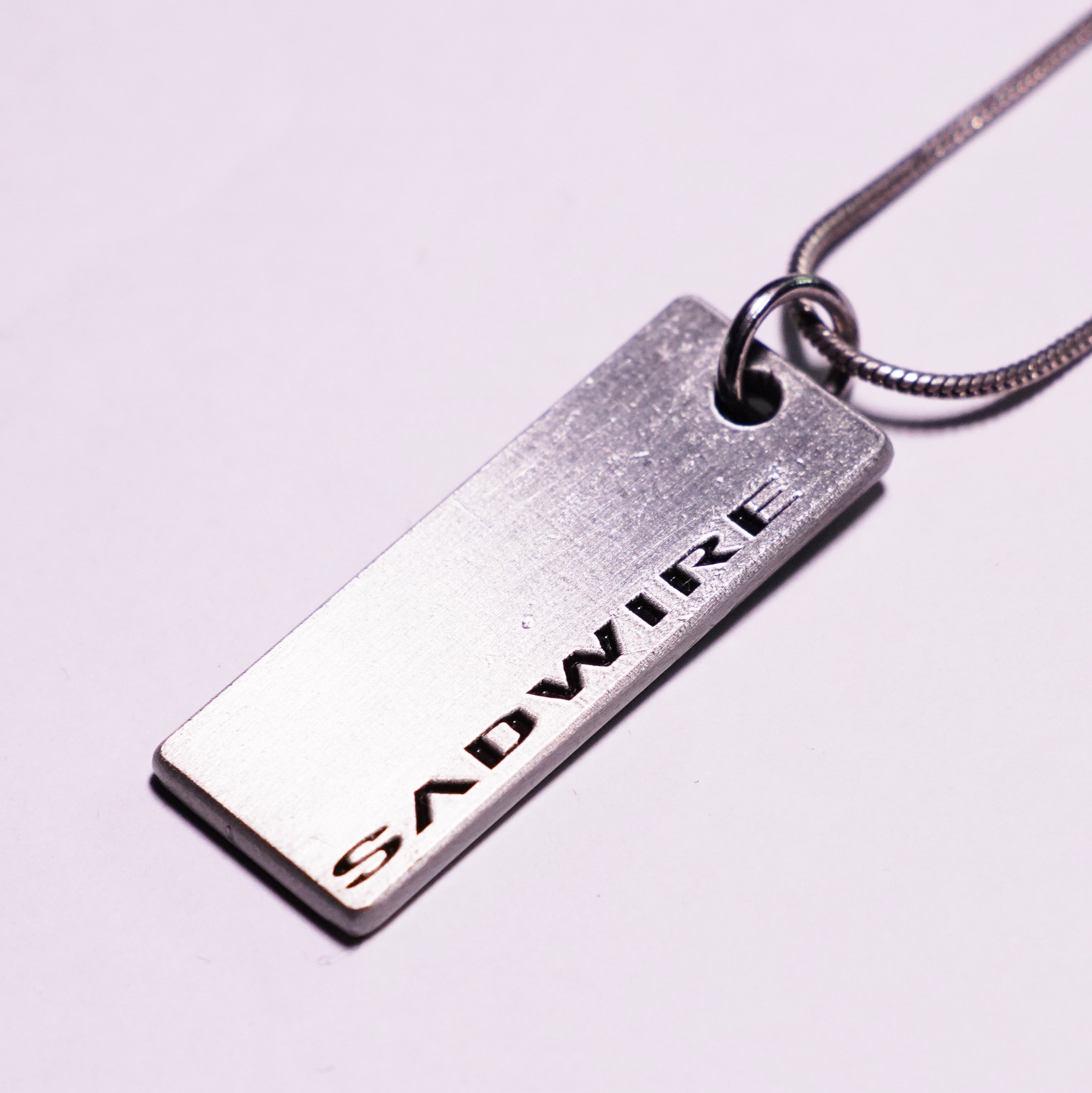 "STEEL CAGE" TAG NECKLACE