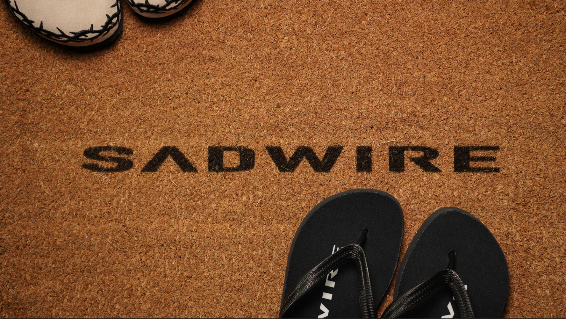 SADWIRE LOGO DOOR MAT